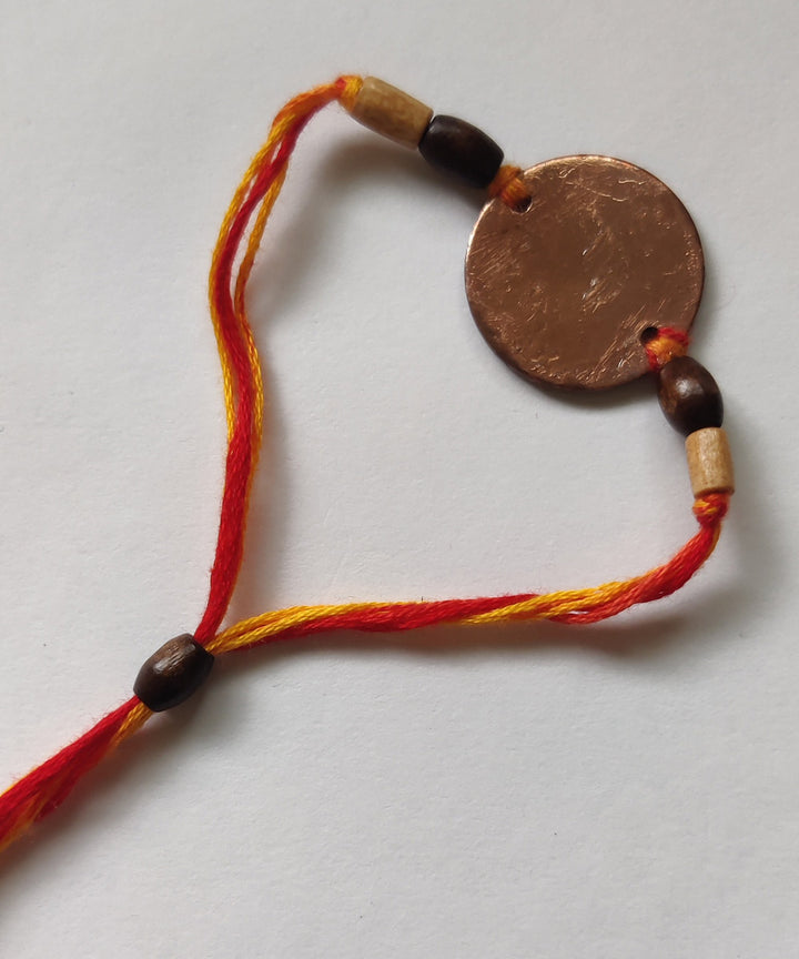 Orange handmade copper enamel rakhi