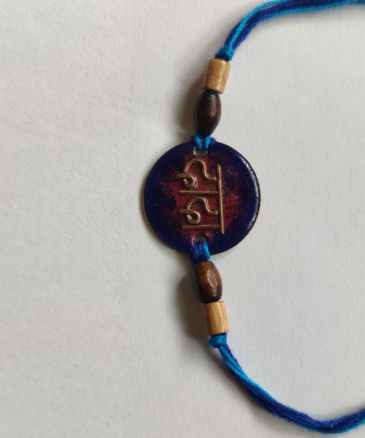 Navy blue hand crafted copper rakhi