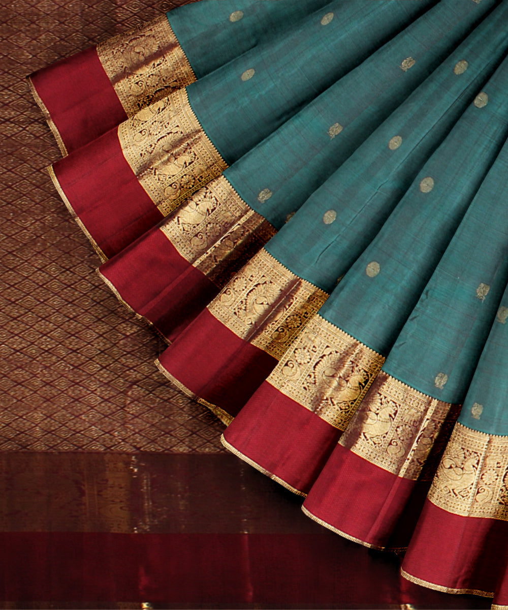 Cyan green red peacock motifs handwoven kancheepuram silk saree