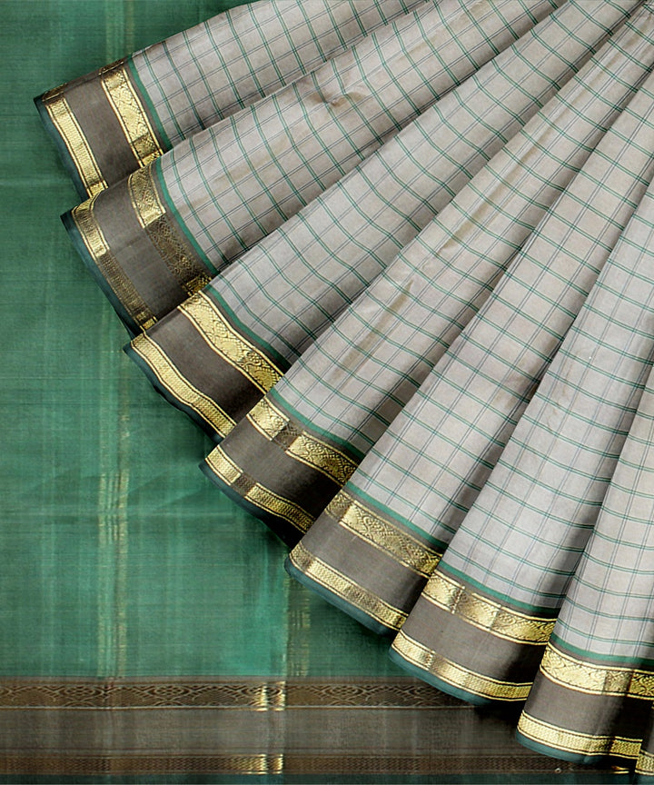 Cream checks teal green pallu silk handloom kancheepuram saree