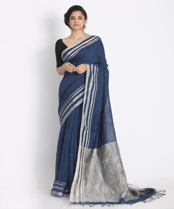 Blue linen saree with silver zori border