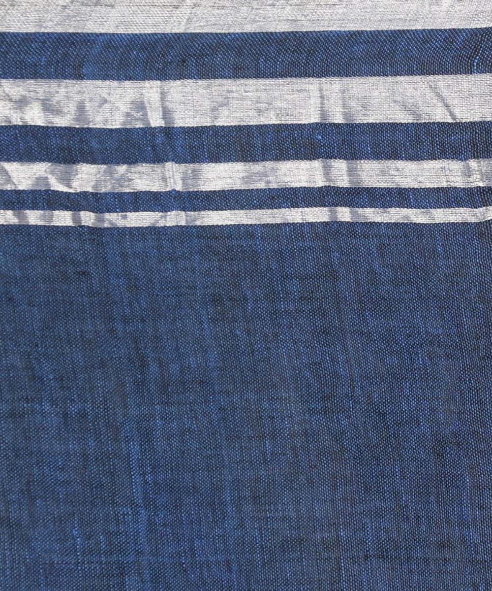 Blue linen saree with silver zori border