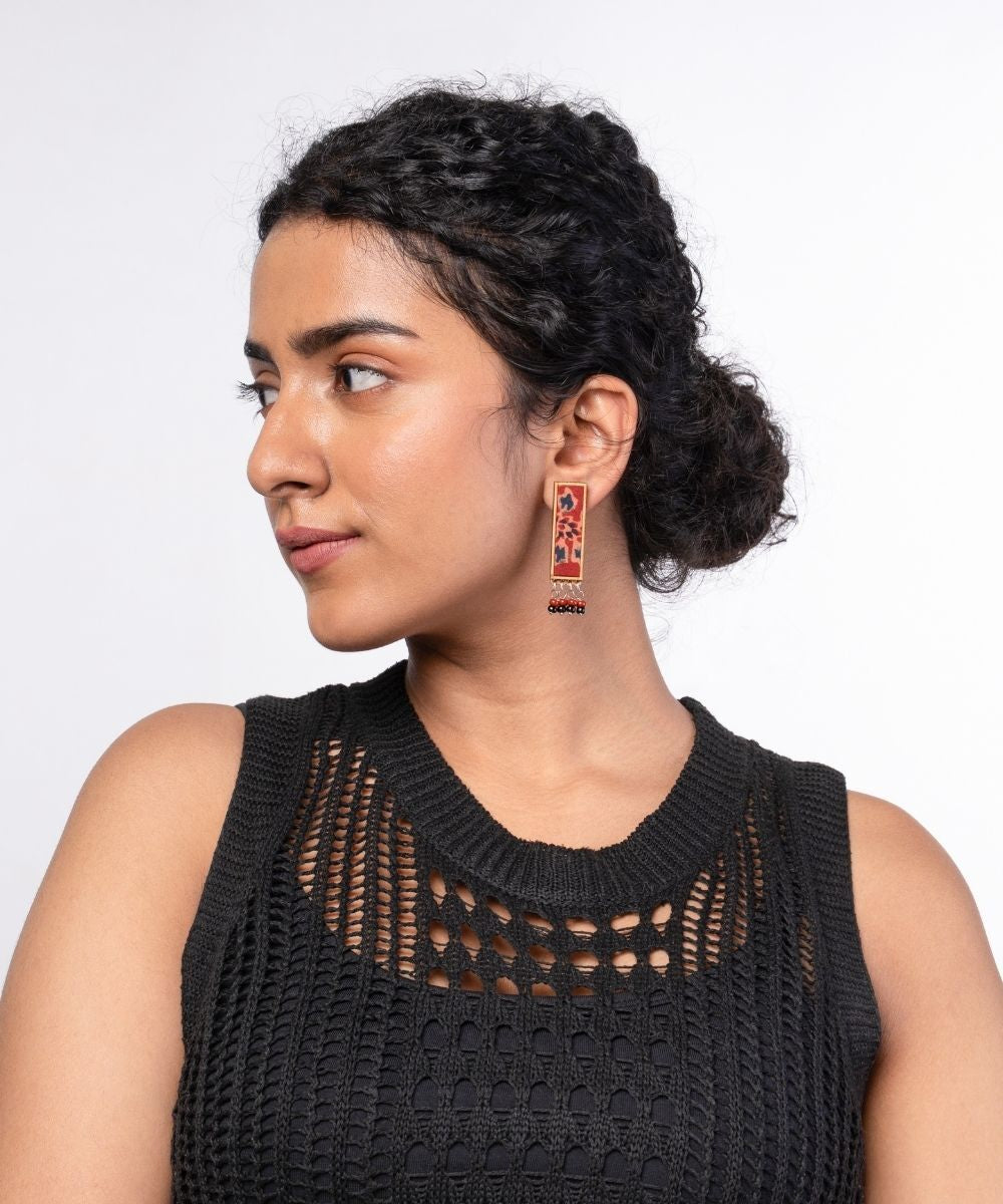Red ajrakh repurposed fabric and wood studs with beads