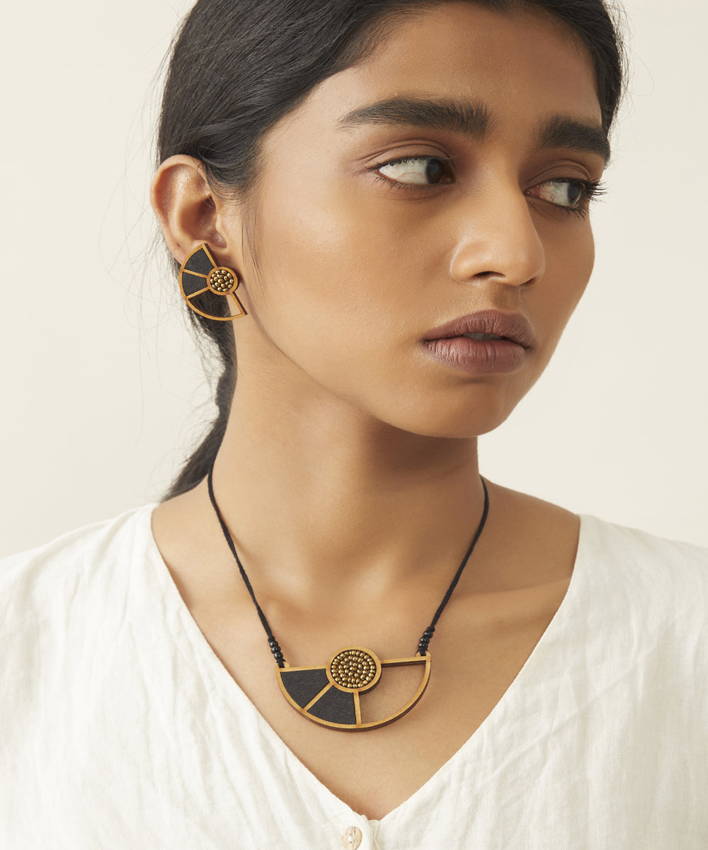 Black geometric repurposed fabric and wood adjustable pendant necklace