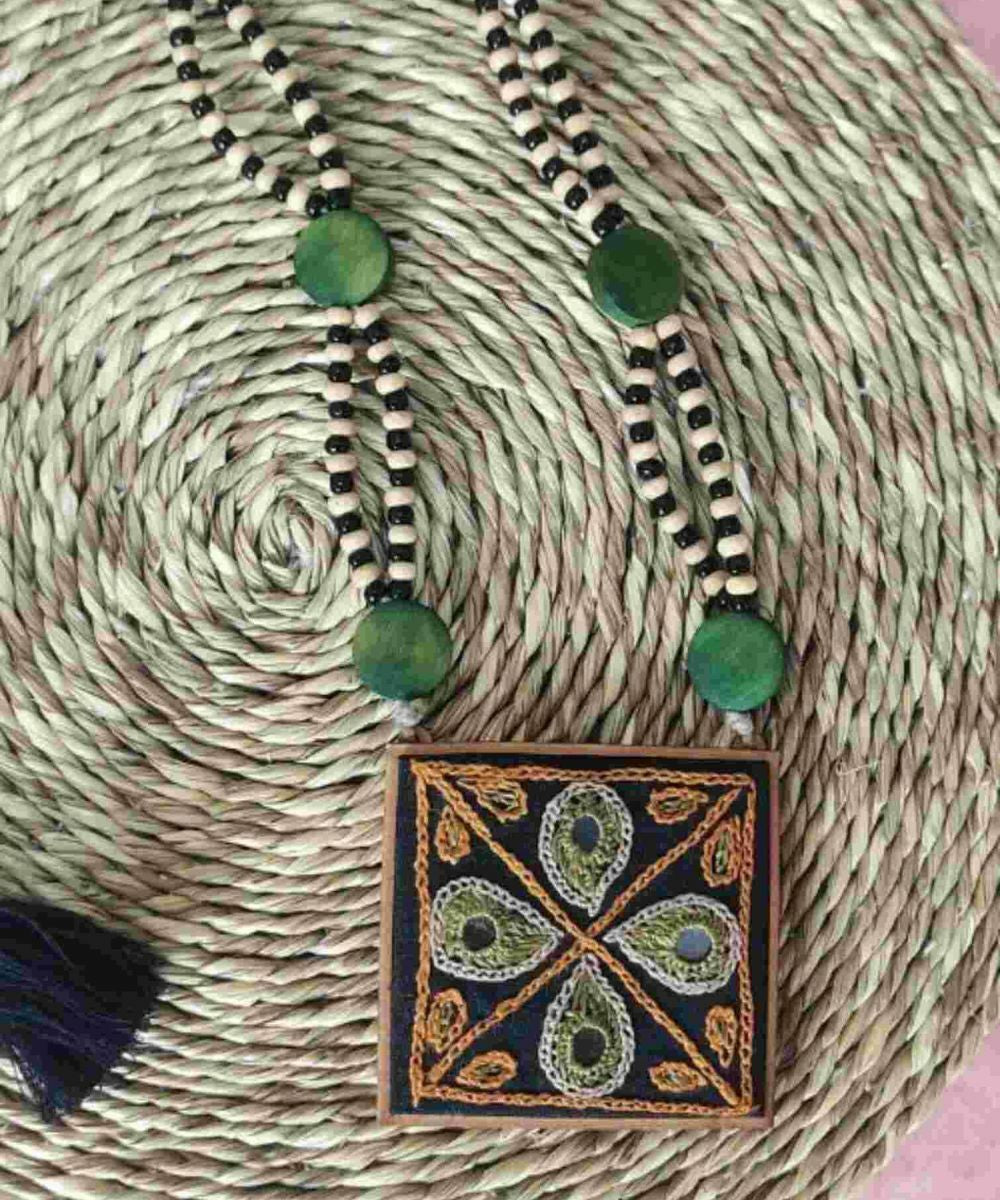 Dark green hand embroidered pendant necklace with beaded string