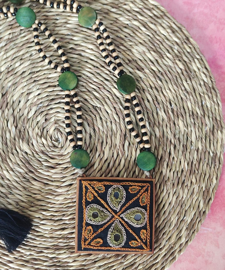 Dark green hand embroidered pendant necklace with beaded string