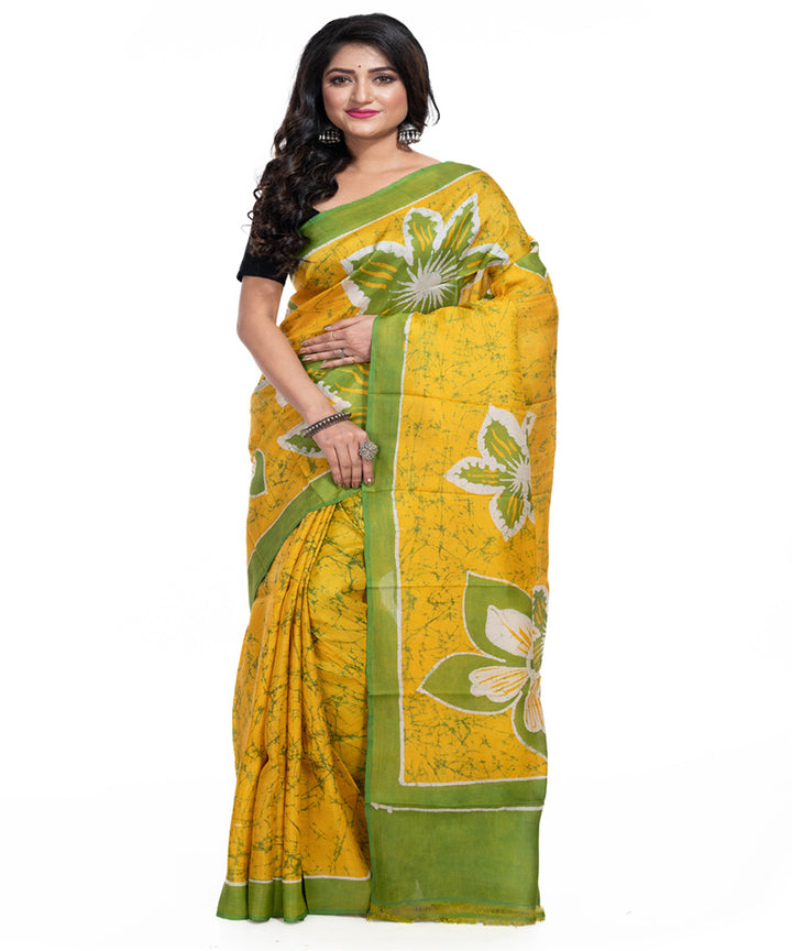 Yellow green silk handwoven batik print saree