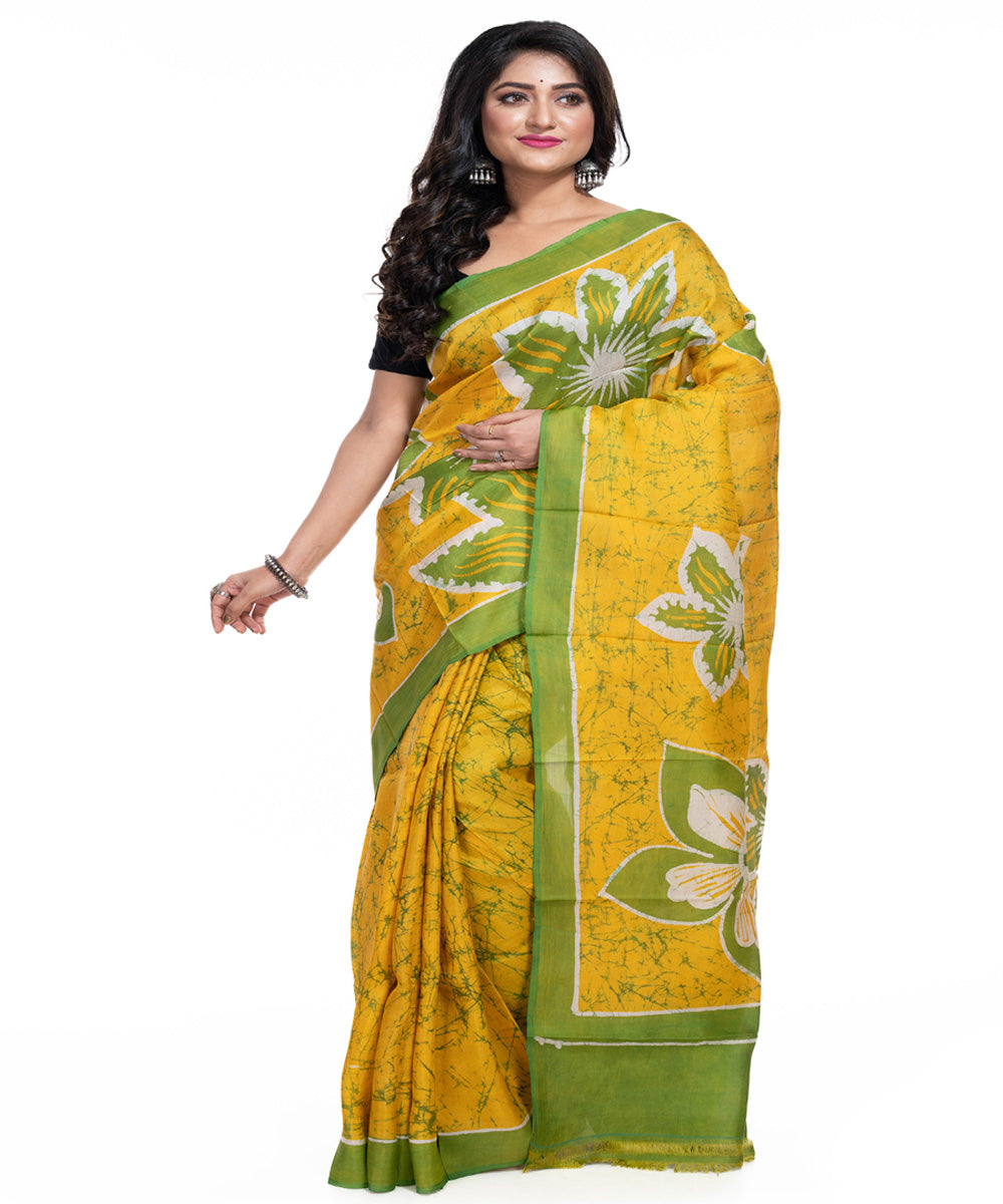 Yellow green silk handwoven batik print saree
