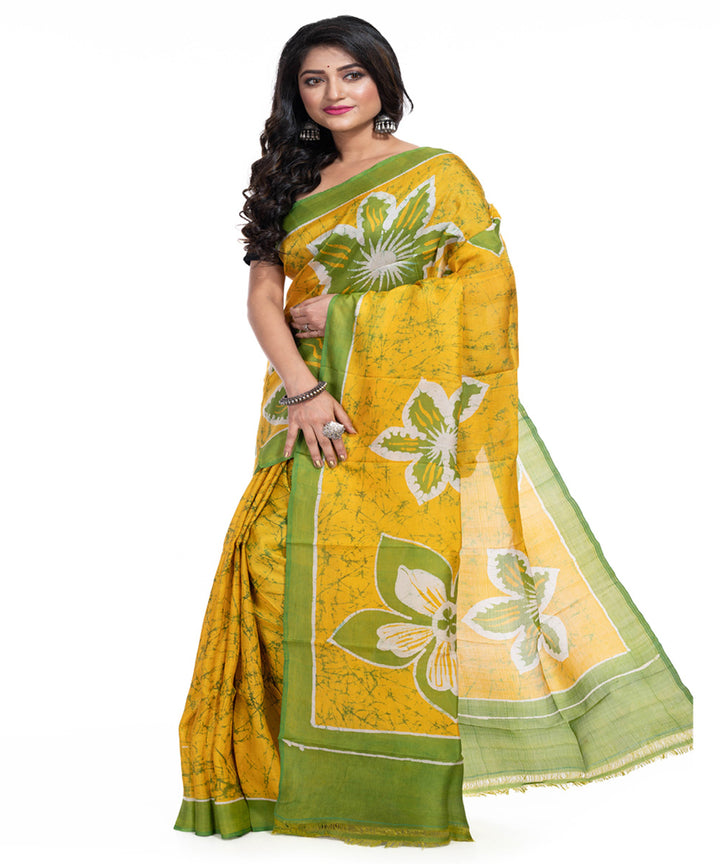 Yellow green silk handwoven batik print saree
