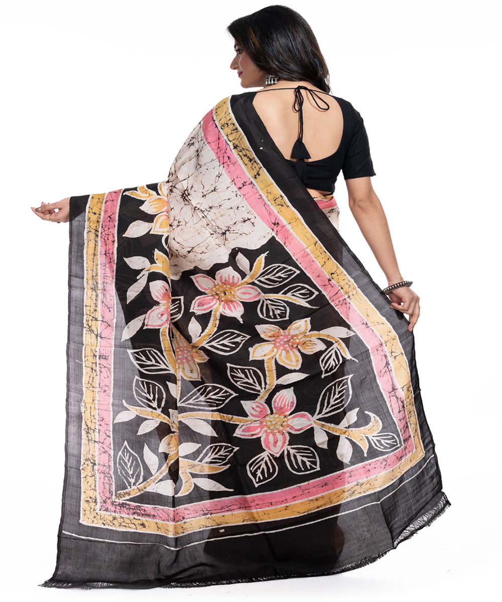 Cream black pink silk handwoven batik print saree
