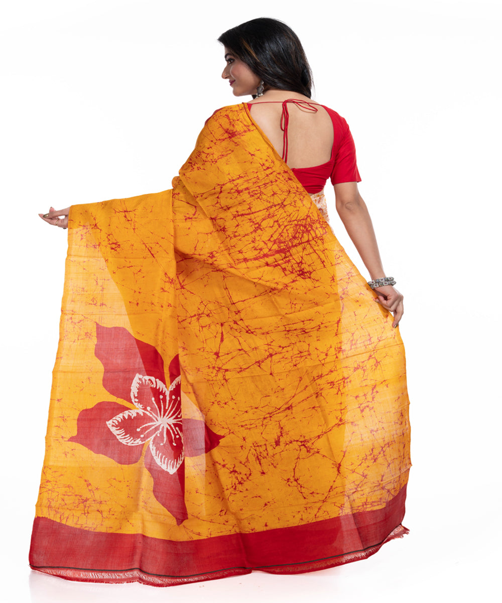 White yellow red silk handwoven batik print saree