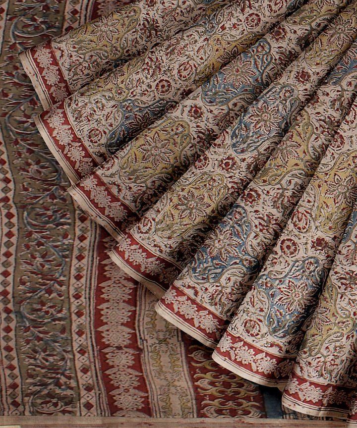 Beige red cyan blue cotton handloom block printed kalamkari saree