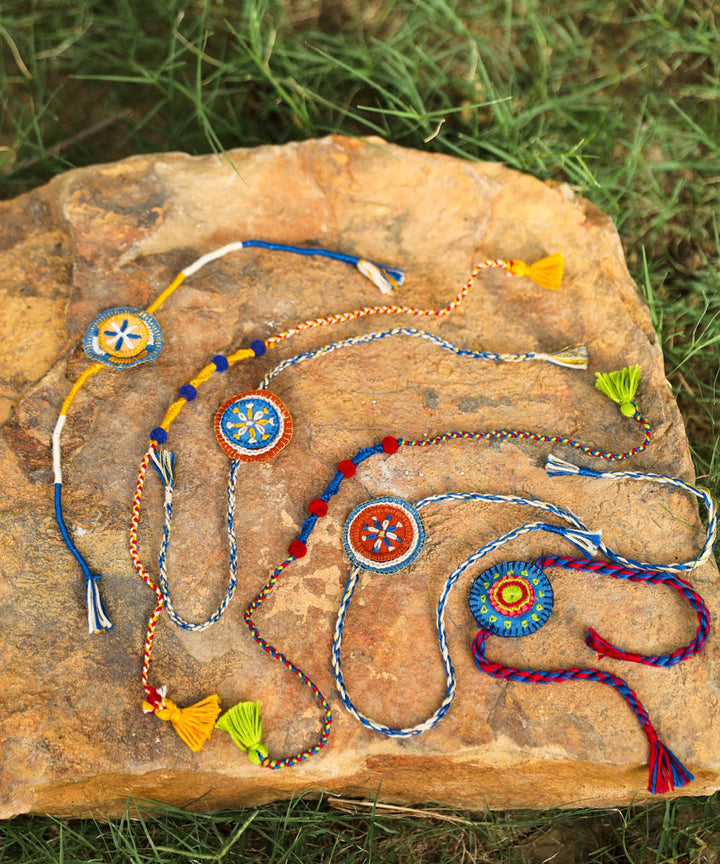 Blue yellow hand embroidered rakhi loomba set