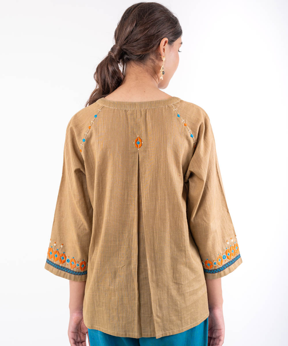 Beige hand embroidered cotton flared top