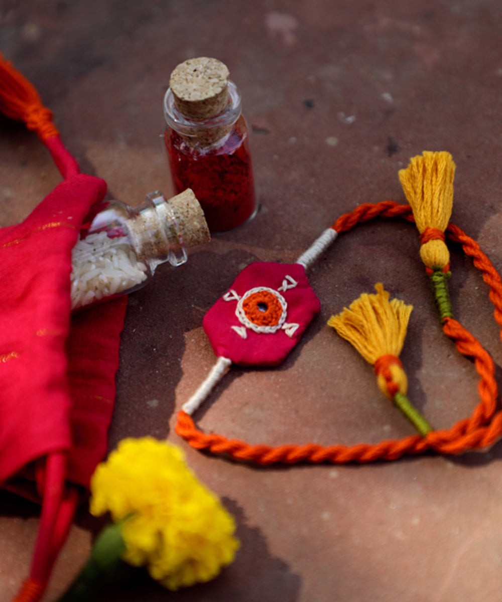 Handcrafted red cotton rakhi set
