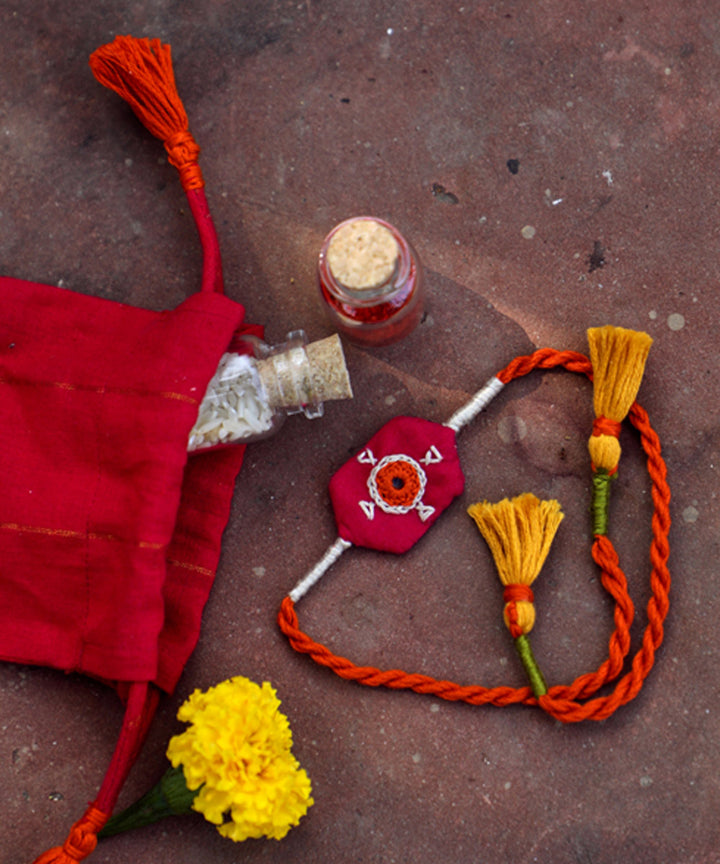 Handcrafted red cotton rakhi set