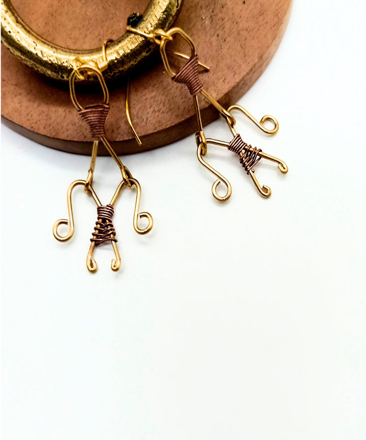 Golden hand made brass earring