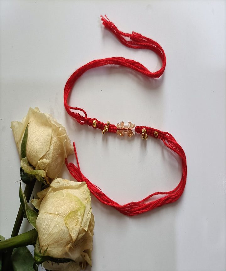 Handmade red woolen acrealic blessing rakhi