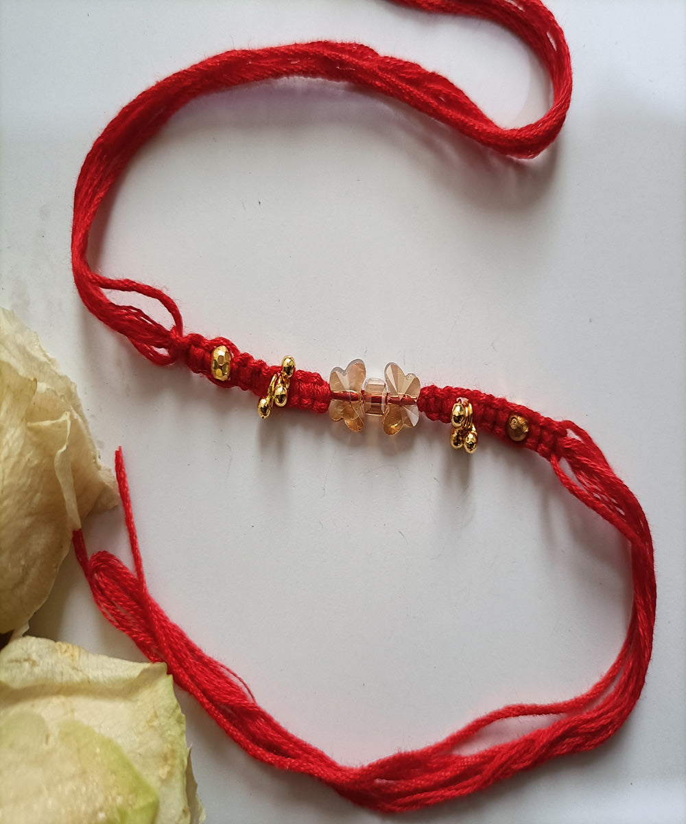 Handmade red woolen acrealic blessing rakhi