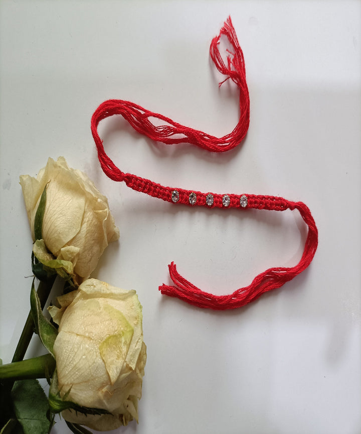 Handmade metal red woolen blessing rakhi
