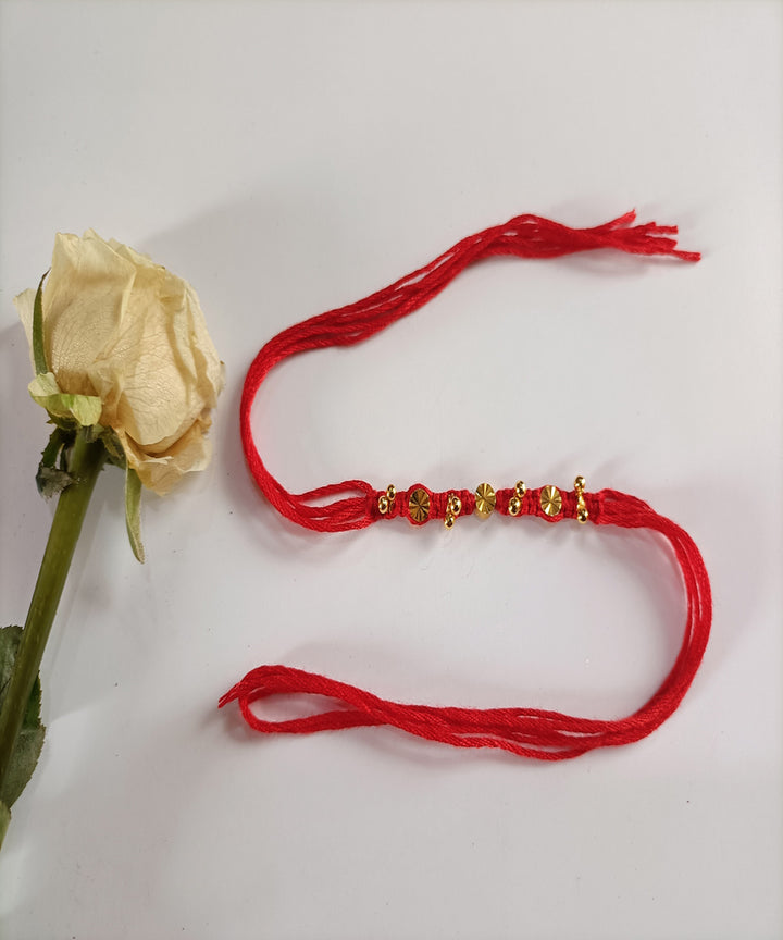 Red handcrafted woolen metal artisanal affections rakhi
