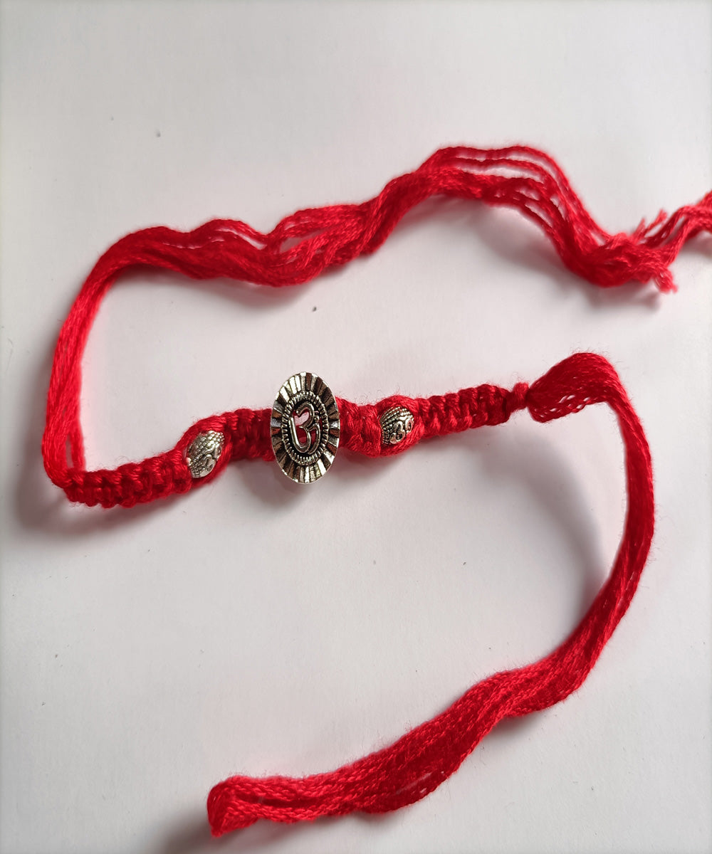 Handcrafted metal unique porsonalized red woolen rakhi