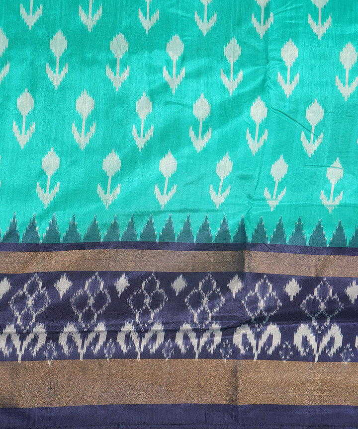 Light green dark blue silk handwoven pochampally ikat saree