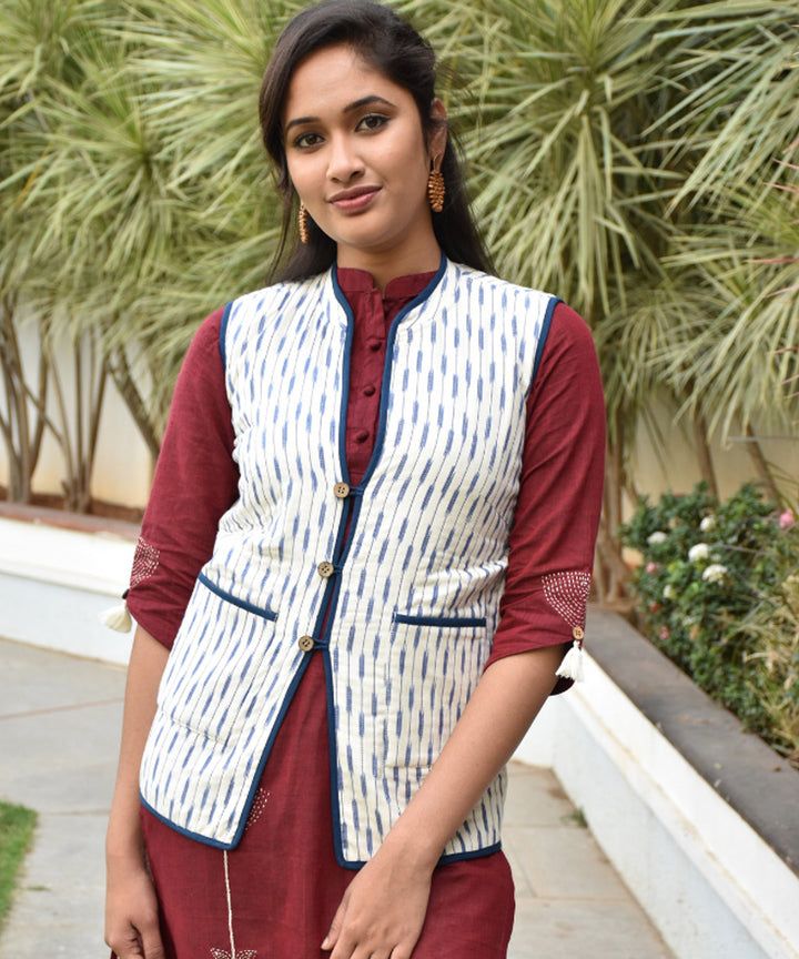 Reversible sleeveless quilted jacket in blue and white handwoven ikat