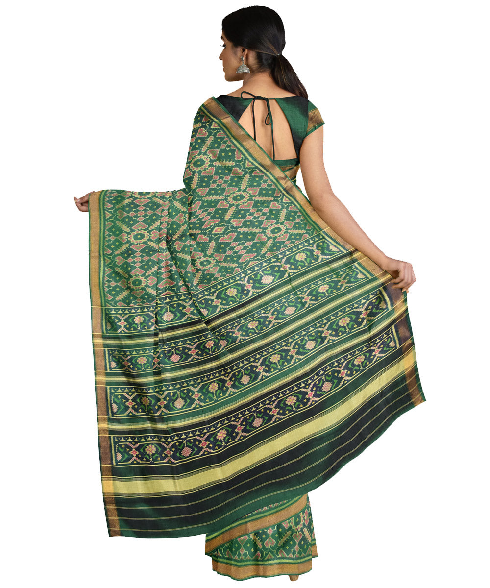 Dark green handloom silk patola saree