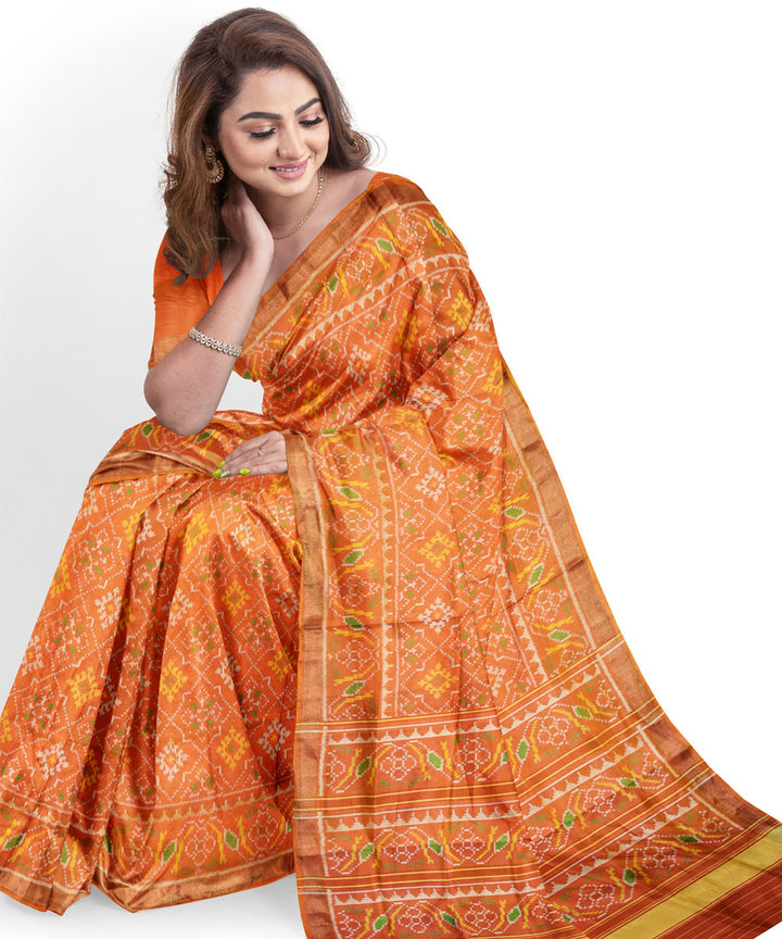 Yellow orange silk handloom patola saree