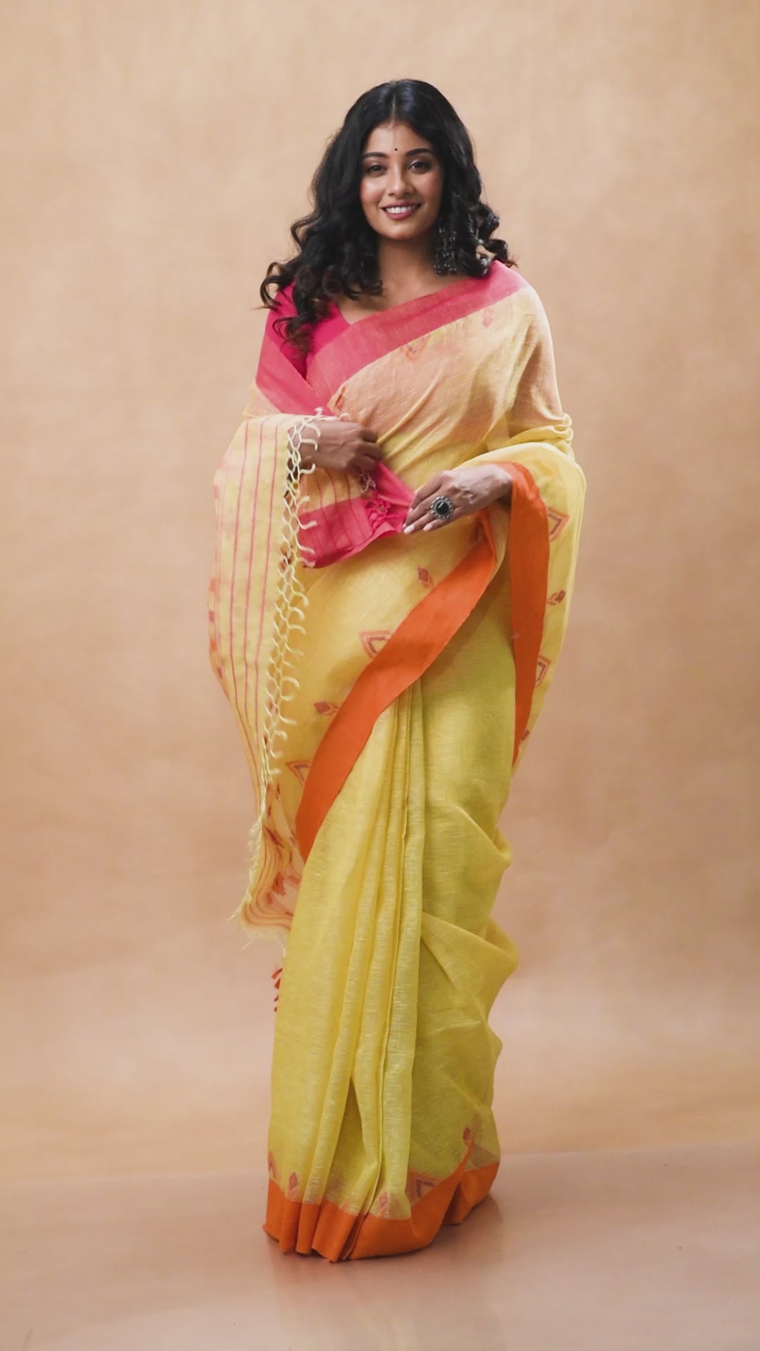 Yellow handwoven linen jamdani saree with ganga jamuna border