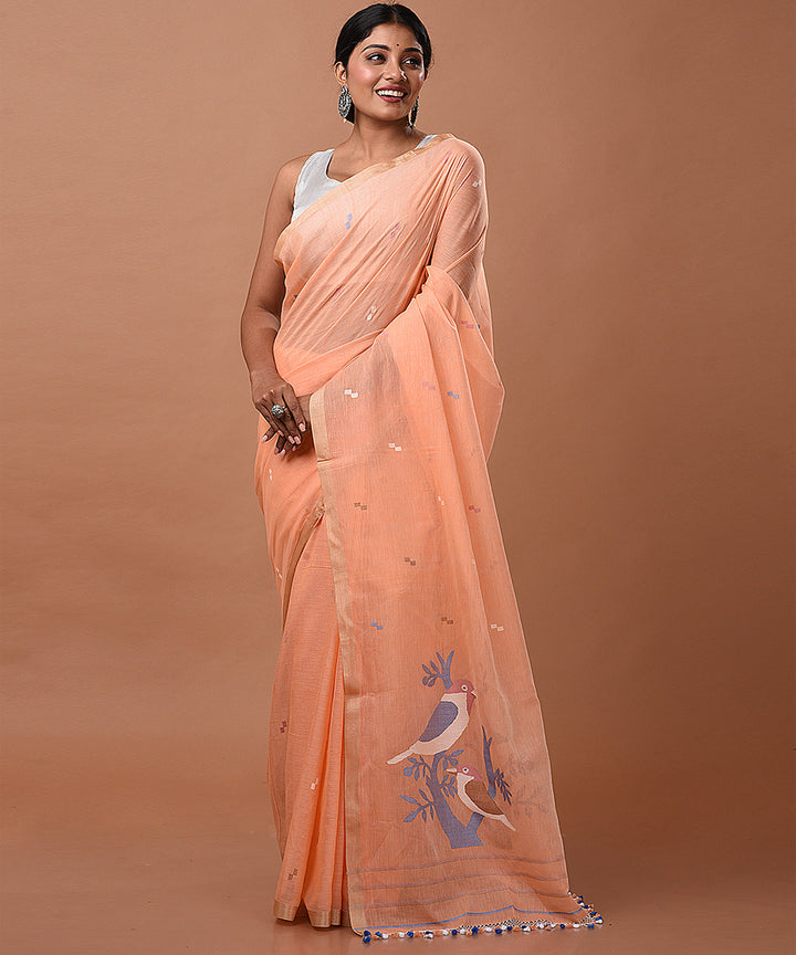 Peach handwoven cotton jamdani saree with tussar border