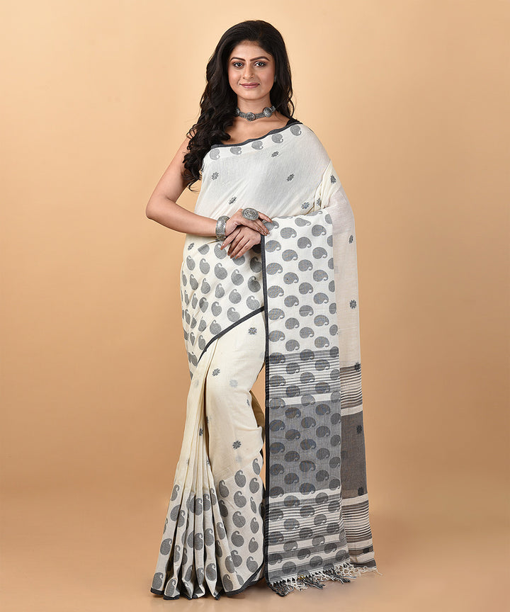 White handwoven cotton jamdani saree