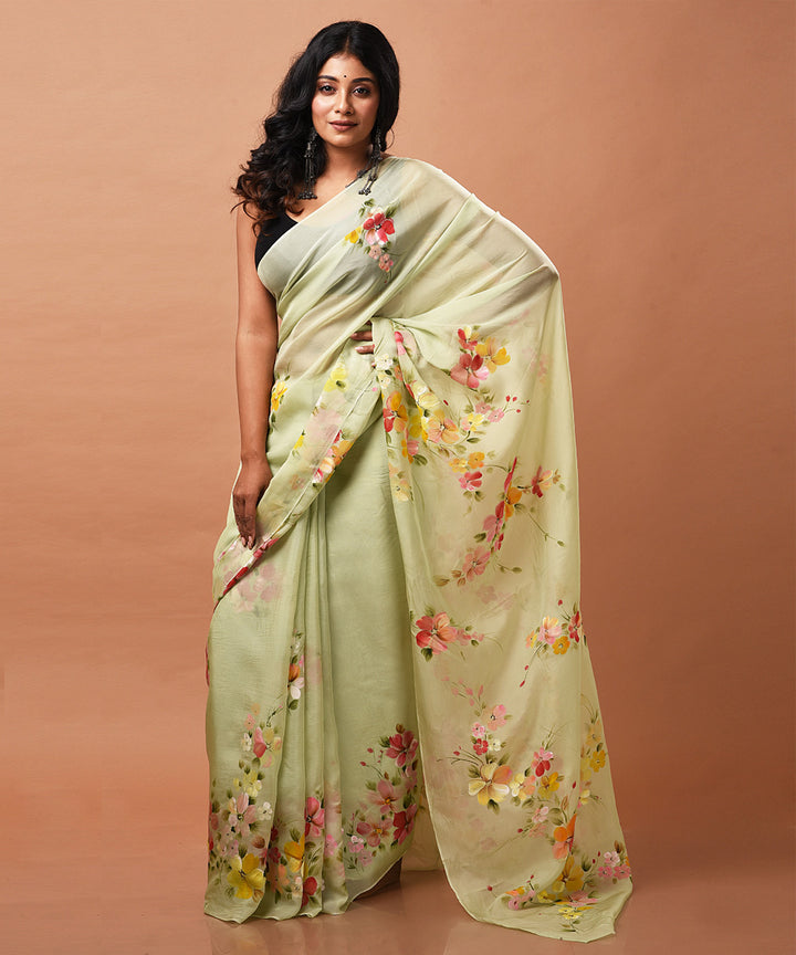 Pale green handwoven organza silk hand painted saree