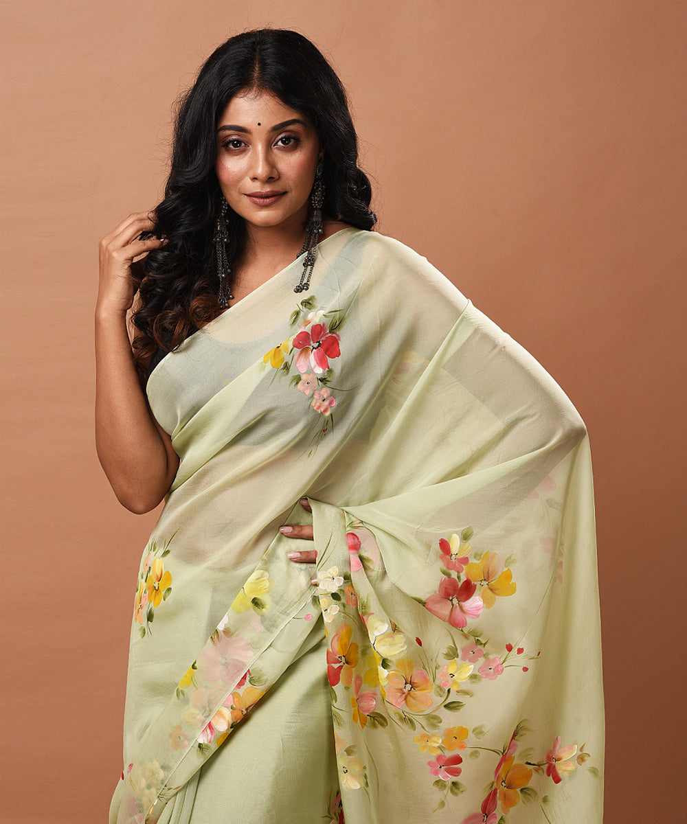 Pale green handwoven organza silk hand painted saree