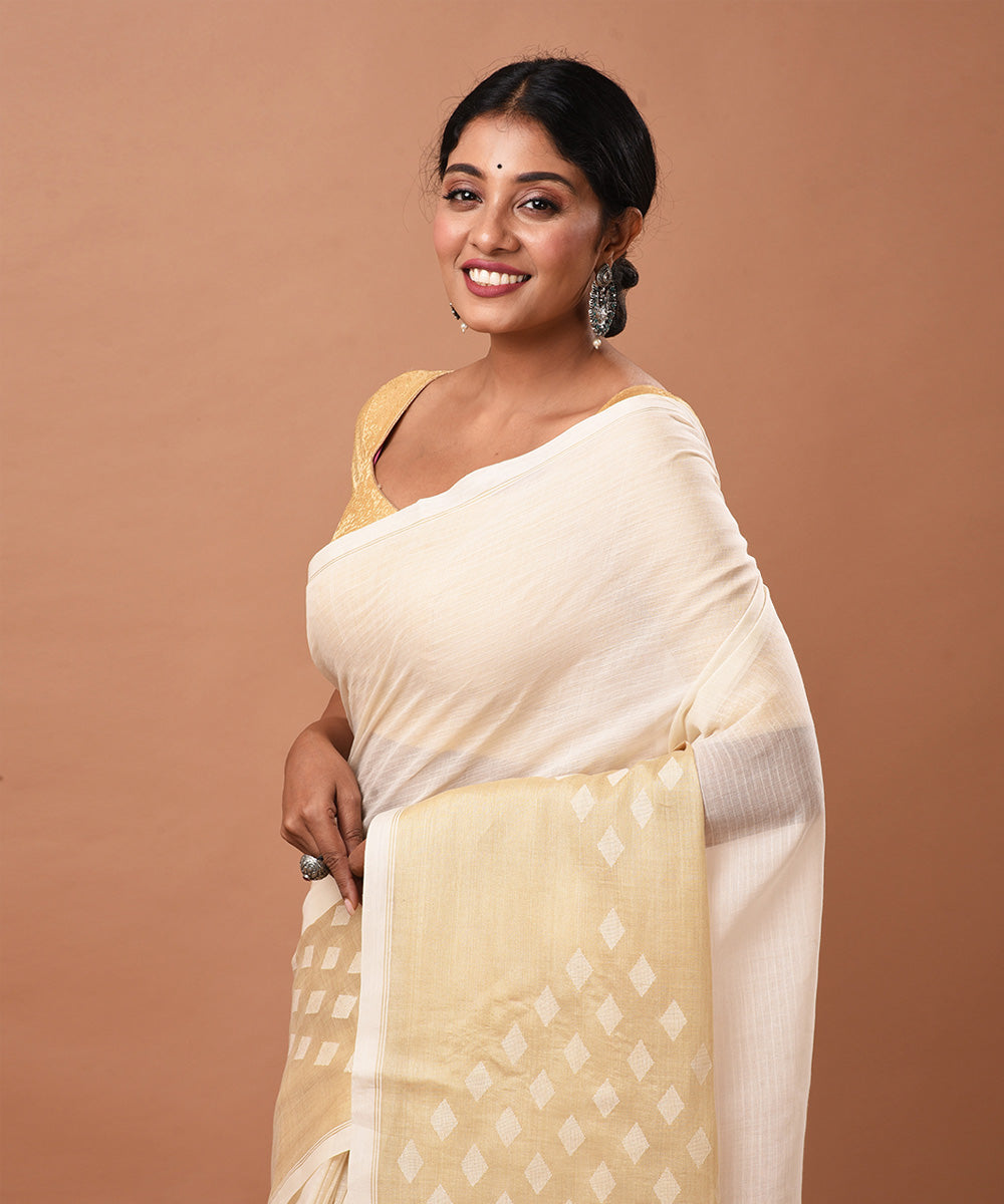 Off white handloom tussar silk by cotton jamdani saree