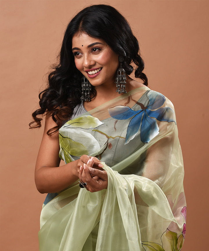 Light hand painted green handwoven organza silk saree