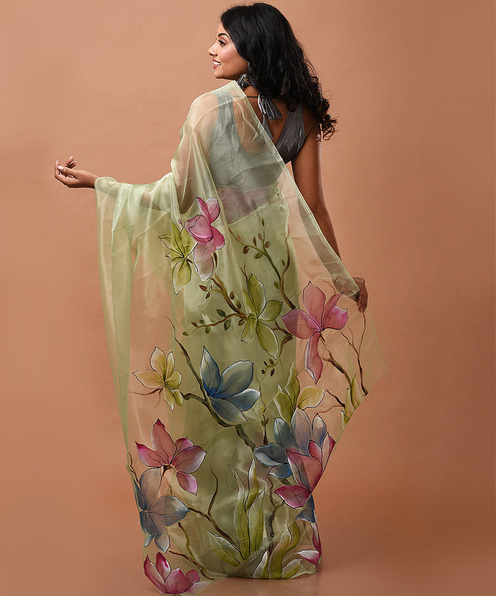 Light hand painted green handwoven organza silk saree