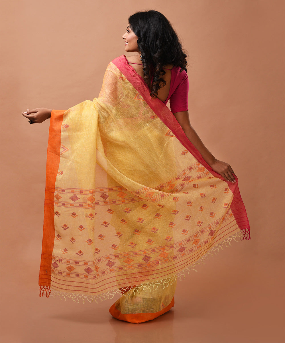 Yellow handwoven linen jamdani saree with ganga jamuna border