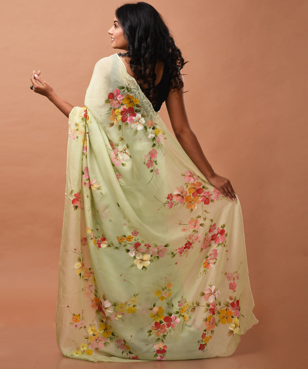 Pale green handwoven organza silk hand painted saree