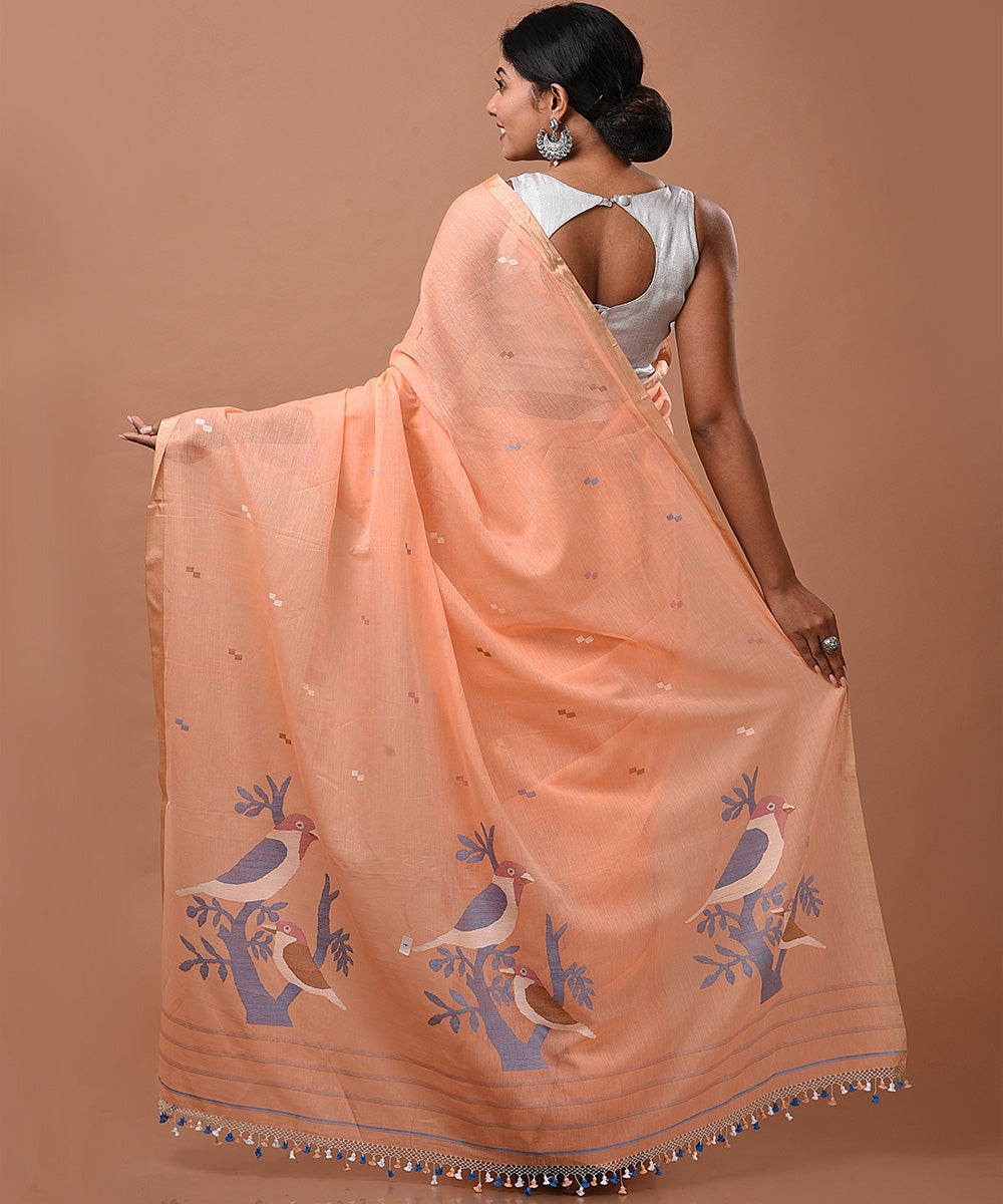 Peach handwoven cotton jamdani saree with tussar border