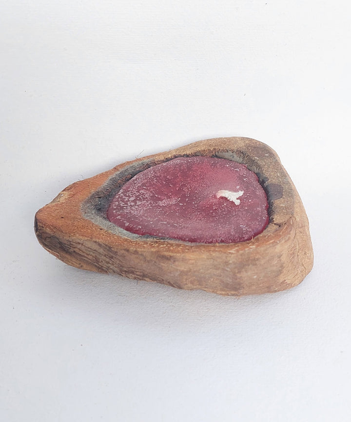 Red handcrafted flat coconut shell candle