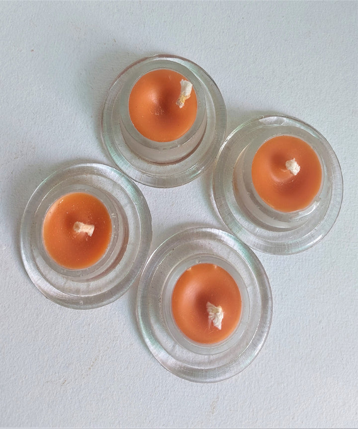 Orange handcrafted glass candle set of 4