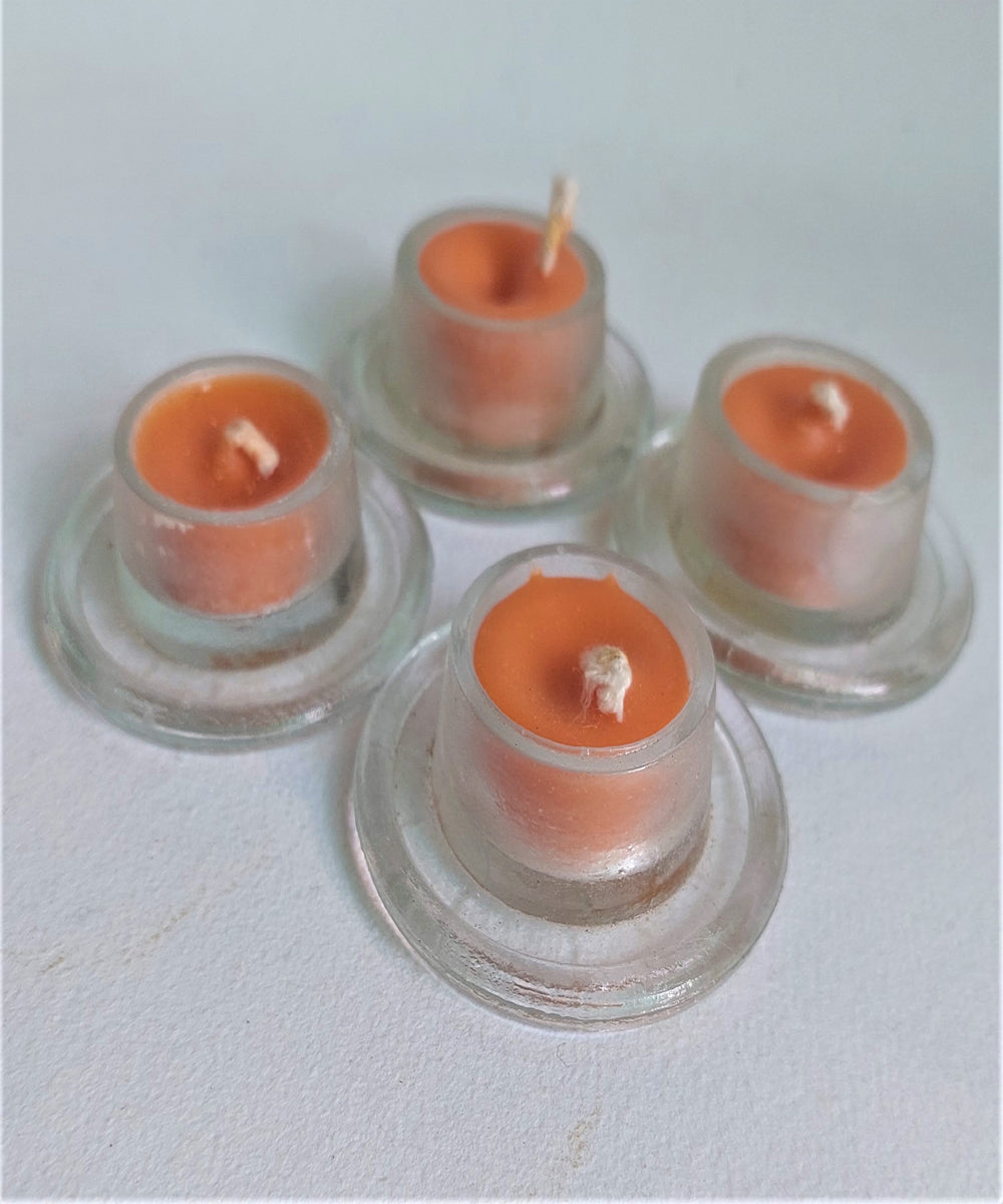 Orange handcrafted glass candle set of 4