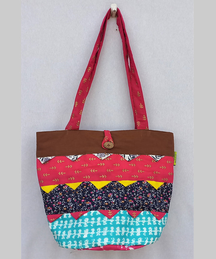 Pink and multicolor handcrafted potli bag