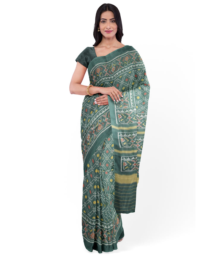 Dark green handwoven cotton patola saree