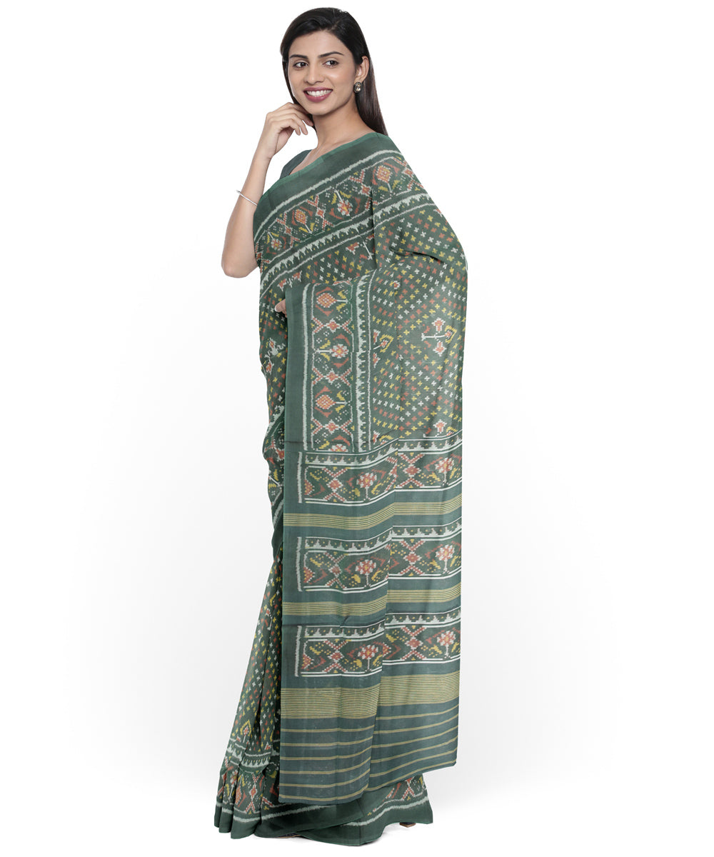 Dark green hand woven cotton patola saree