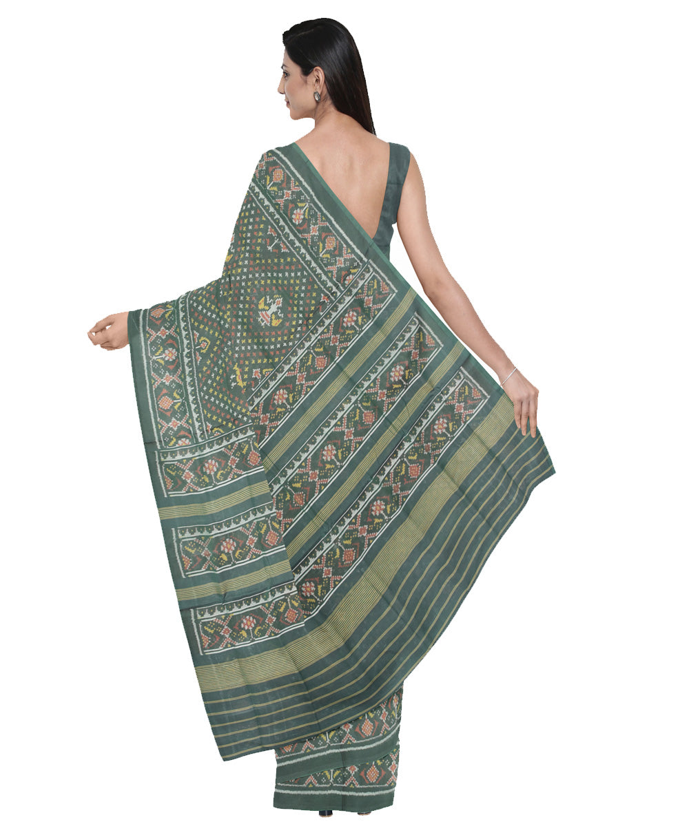 Dark green hand woven cotton patola saree