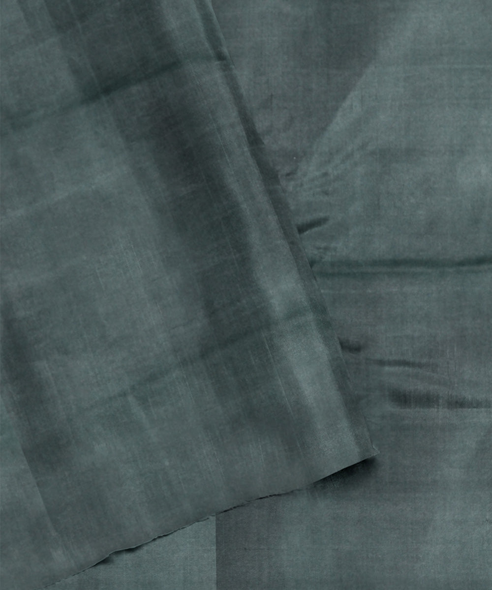 Dark green hand woven cotton patola saree