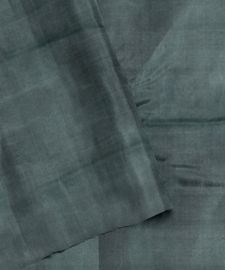 Dark green hand woven cotton patola saree